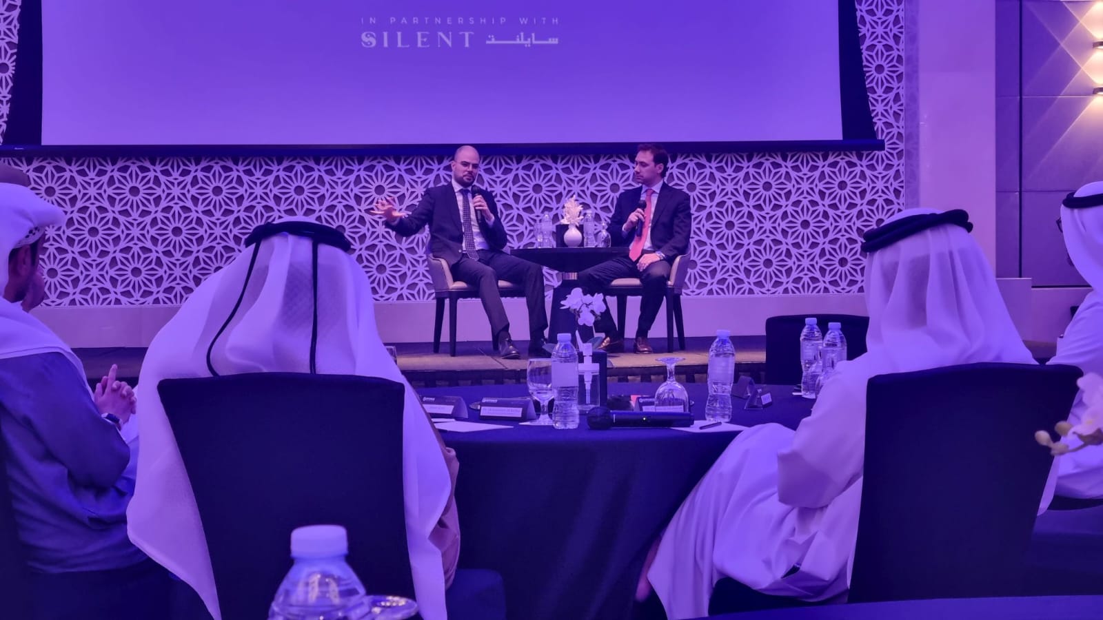 Fireside chat at the Efforce Dubai event in partnership with Silent Unicorn, with an audience in traditional UAE attire